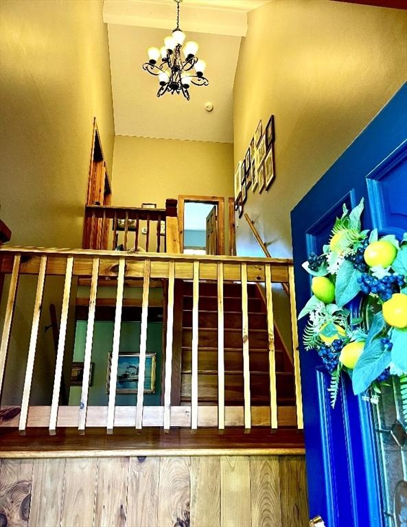 1472 Pleasant St, Athol, MA 01331 - stairway with a chandelier and high vaulted ceiling