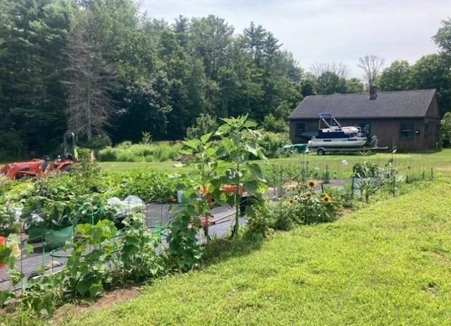 1472 Pleasant St, Athol, MA 01331 - view of green lawn with a garden and a forest view