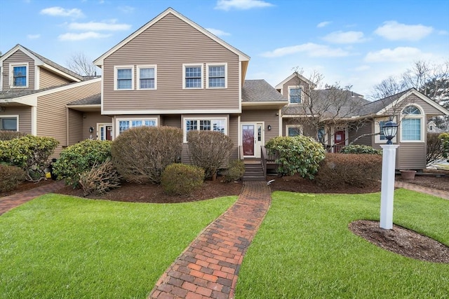 view of front facade with a front yard