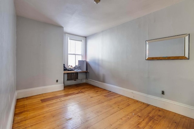 unfurnished room featuring light wood-type flooring