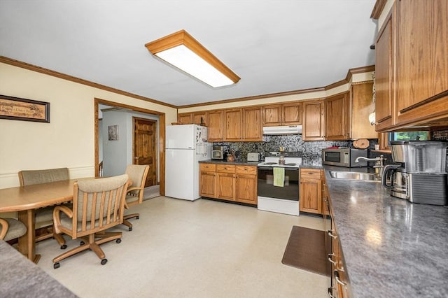 4 Pleasantview Ave, Tyngsborough, MA 01879 - kitchen featuring electric stove, freestanding refrigerator, under cabinet range hood, a sink, and brown cabinetry