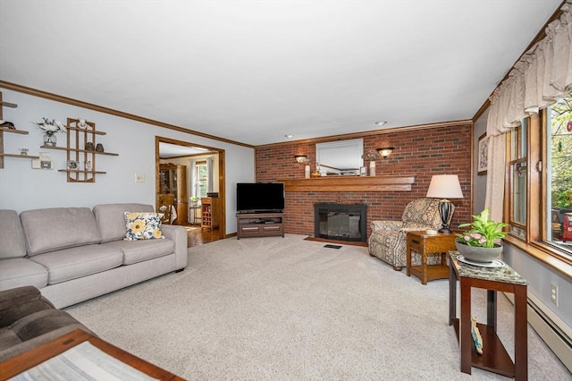 4 Pleasantview Ave, Tyngsborough, MA 01879 - carpeted living room with baseboard heating, a brick fireplace, crown molding, and brick wall