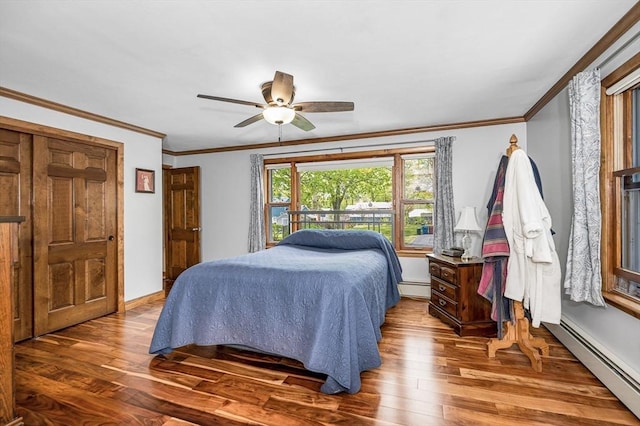 4 Pleasantview Ave, Tyngsborough, MA 01879 - bedroom with a baseboard heating unit, wood finished floors, crown molding, a ceiling fan, and baseboards