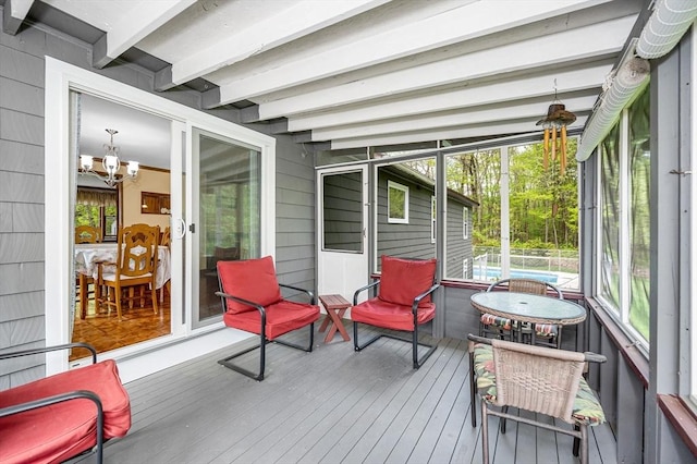 4 Pleasantview Ave, Tyngsborough, MA 01879 - sunroom / solarium with beamed ceiling, a chandelier, and plenty of natural light