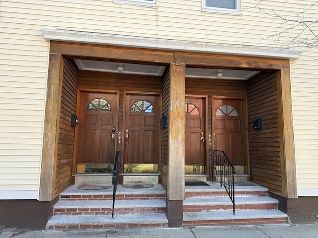 doorway to property with an attached garage