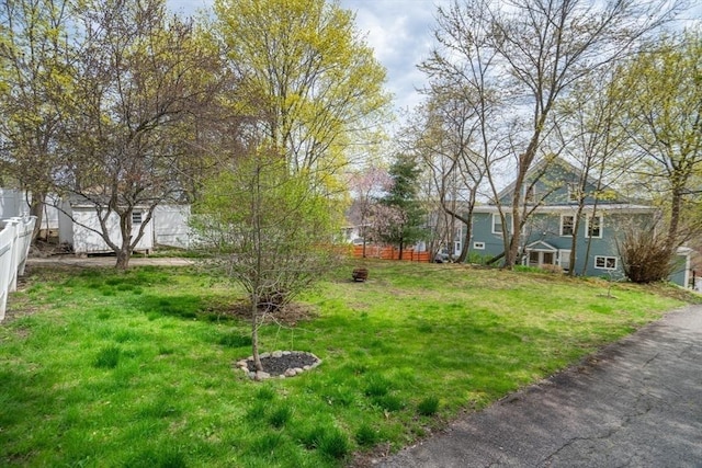 view of yard with fence