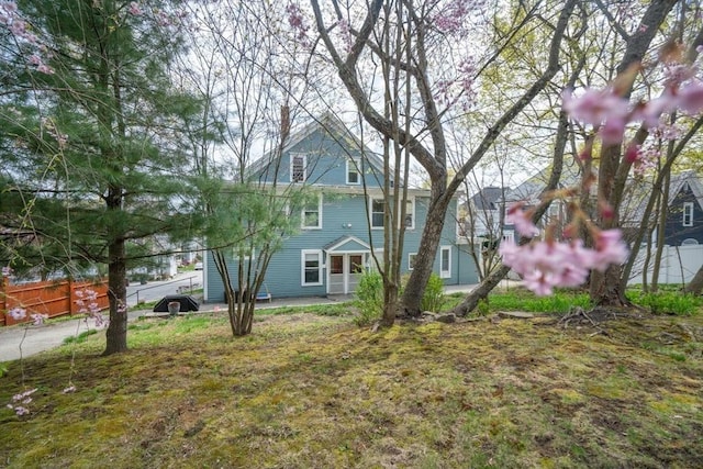 view of front of property with fence