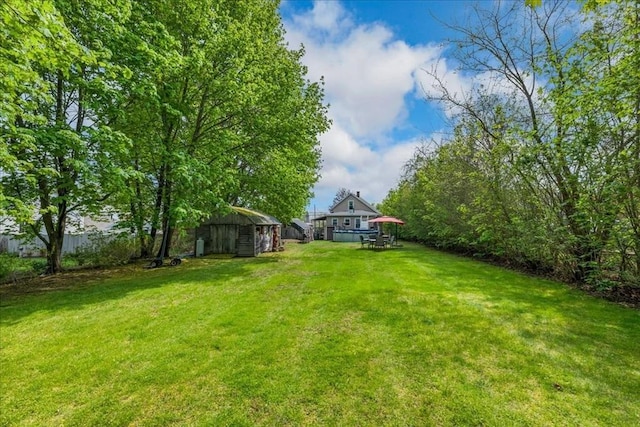 1241 Riverside Ave, Somerset, MA 02726 - view of yard with a storage unit and an outdoor structure