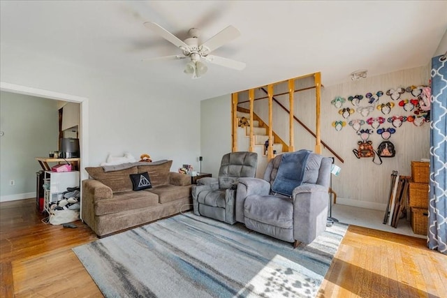 1241 Riverside Ave, Somerset, MA 02726 - living room with light wood-style floors, stairway, baseboards, and a ceiling fan
