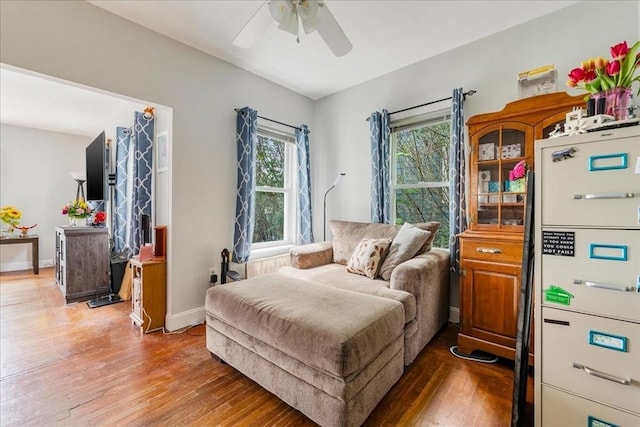 1241 Riverside Ave, Somerset, MA 02726 - living area with baseboards, a ceiling fan, and wood finished floors
