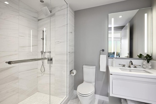 bathroom featuring toilet, an enclosed shower, and vanity