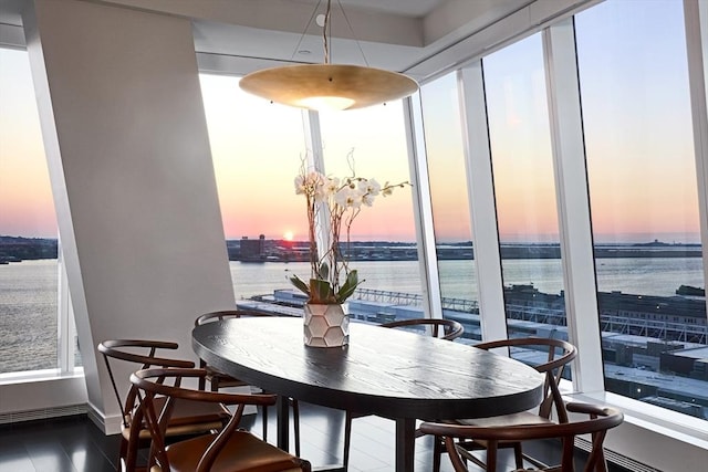 dining area featuring a water view