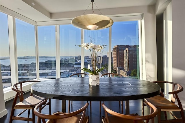 sunroom / solarium with a water view