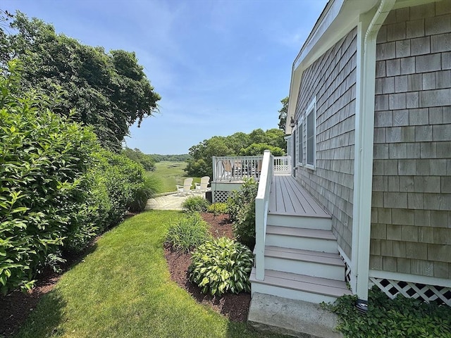 15 Wales Dr, Bourne, MA 02559 - view of yard featuring a wooden deck and stairway