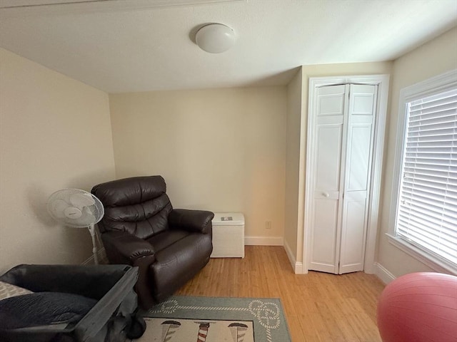 15 Wales Dr, Bourne, MA 02559 - living area with light wood-style floors and baseboards