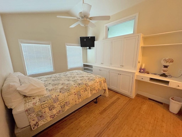 15 Wales Dr, Bourne, MA 02559 - bedroom featuring multiple windows, light wood finished floors, lofted ceiling, and a ceiling fan