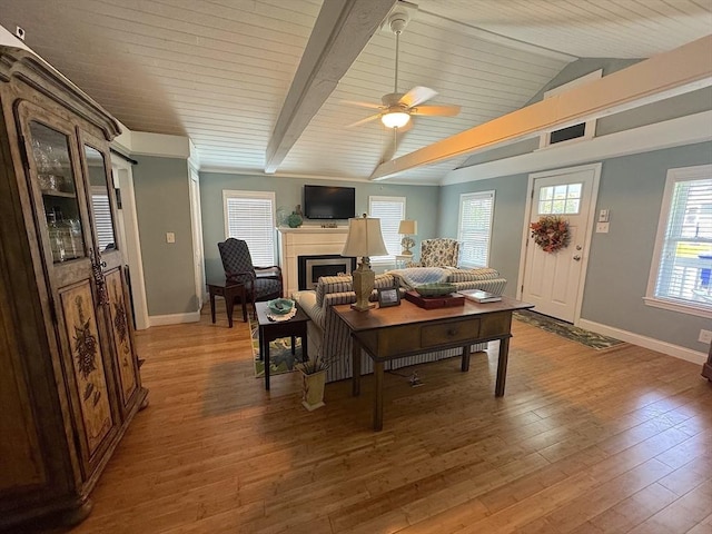 15 Wales Dr, Bourne, MA 02559 - living room with a fireplace, wood finished floors, and ceiling fan