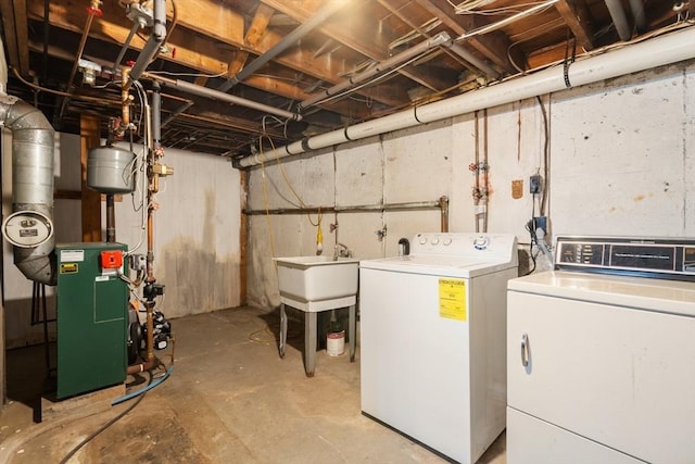 unfinished below grade area with a heating unit and washing machine and clothes dryer