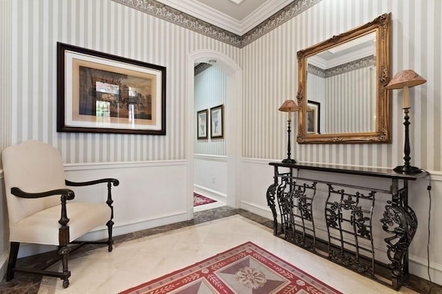 living area featuring ornamental molding