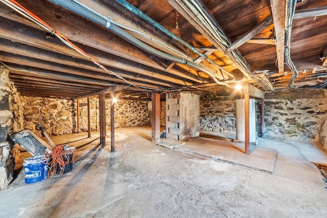 basement featuring water heater