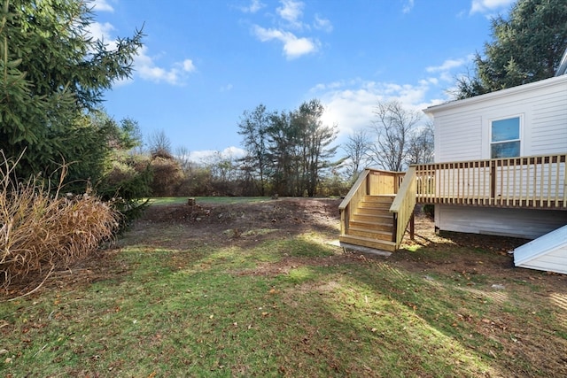 view of yard featuring a deck