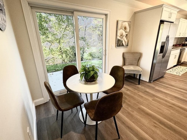 dining room with light hardwood / wood-style flooring