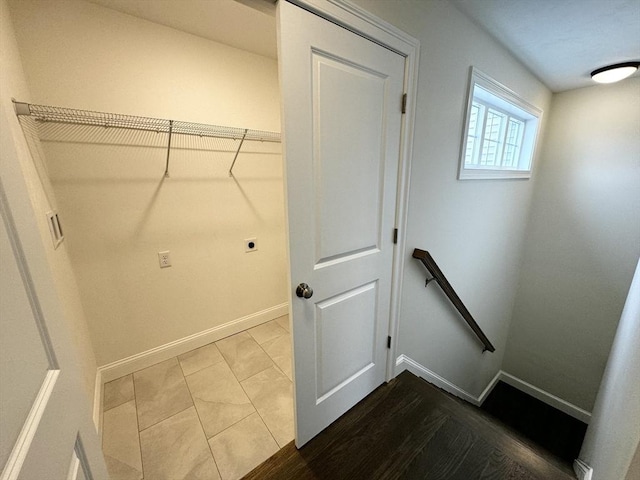 clothes washing area with tile patterned floors and electric dryer hookup