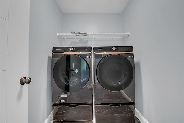 laundry area featuring washer and clothes dryer