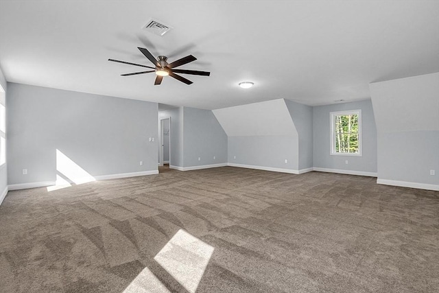 interior space with carpet, lofted ceiling, and ceiling fan