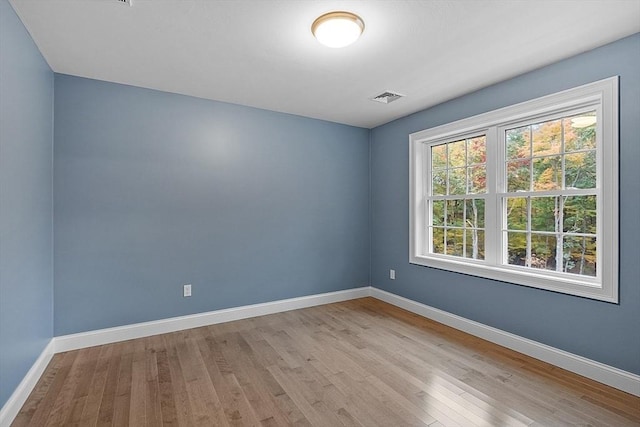 empty room with light wood-type flooring