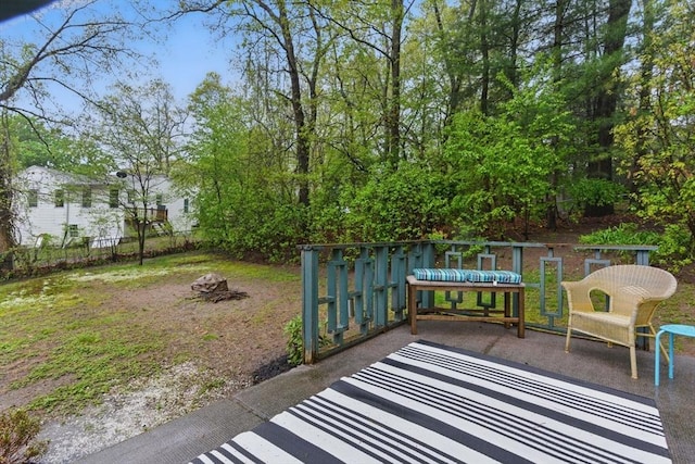 view of patio / terrace featuring fence