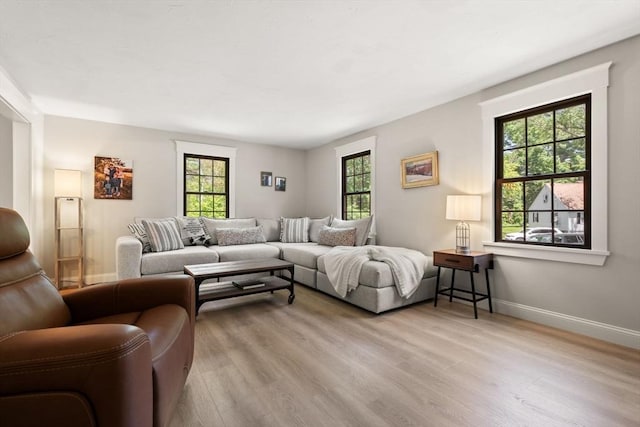 38 Manchaug Rd, Sutton, MA 01590 - living room with wood finished floors and baseboards