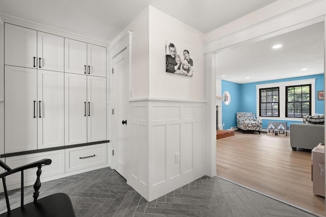 38 Manchaug Rd, Sutton, MA 01590 - mudroom with a wainscoted wall, a decorative wall, and parquet floors