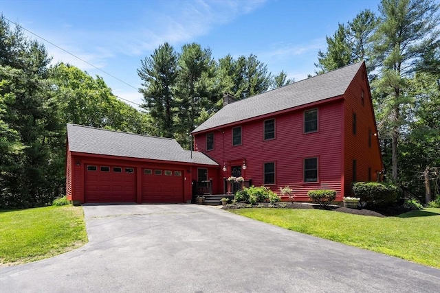 38 Manchaug Rd, Sutton, MA 01590 - view of front of home with a garage, roof with shingles, concrete driveway, and a front lawn