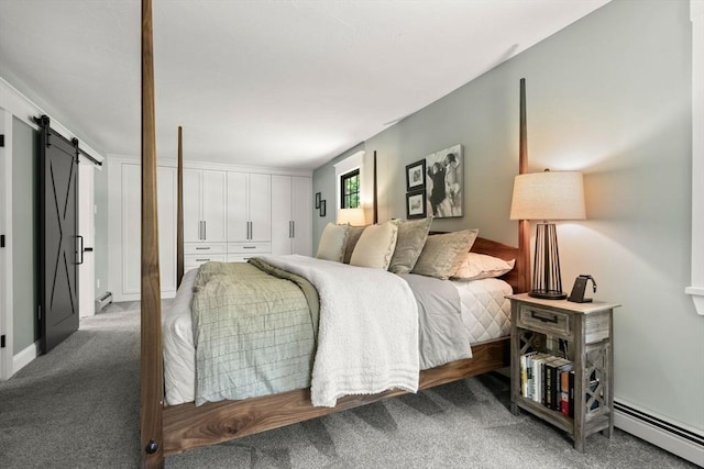 38 Manchaug Rd, Sutton, MA 01590 - bedroom featuring a baseboard heating unit, a barn door, and carpet