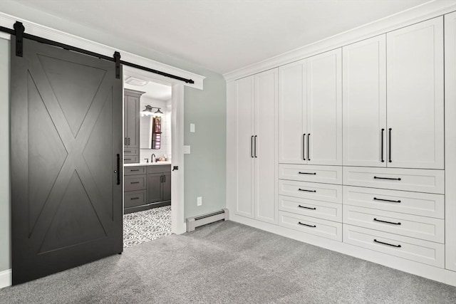 38 Manchaug Rd, Sutton, MA 01590 - closet with baseboard heating and a sink
