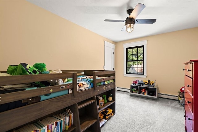 38 Manchaug Rd, Sutton, MA 01590 - carpeted bedroom with a baseboard radiator and ceiling fan