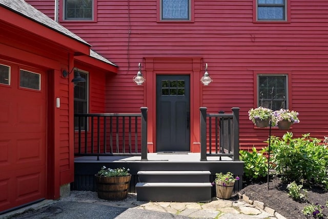 38 Manchaug Rd, Sutton, MA 01590 - property entrance featuring a garage