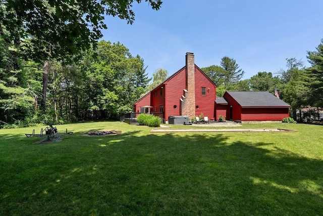 38 Manchaug Rd, Sutton, MA 01590 - view of grassy yard with a deck