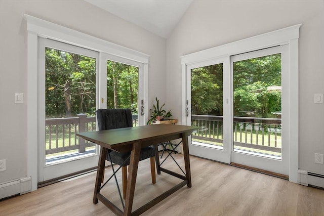38 Manchaug Rd, Sutton, MA 01590 - office featuring vaulted ceiling, plenty of natural light, a baseboard heating unit, and light wood-style flooring