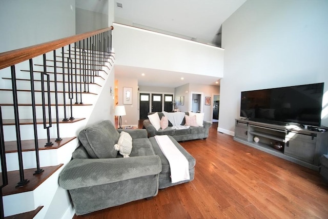 114 Country Club Way, Kingston, MA 02364 - living area with recessed lighting, baseboards, stairs, and wood finished floors