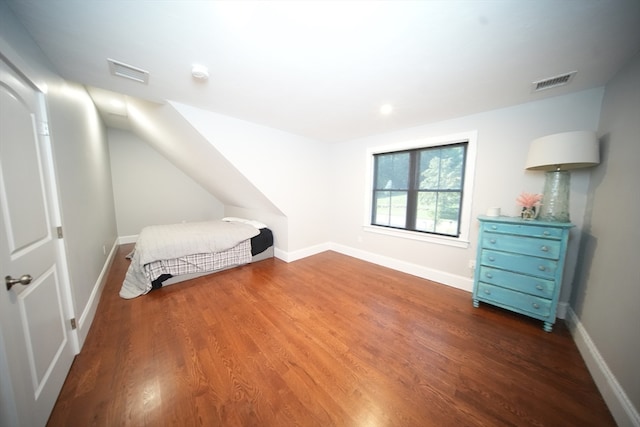 unfurnished bedroom featuring wood-type flooring