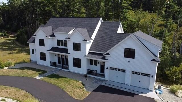 114 Country Club Way, Kingston, MA 02364 - view of front of home featuring driveway, a garage, and roof with shingles
