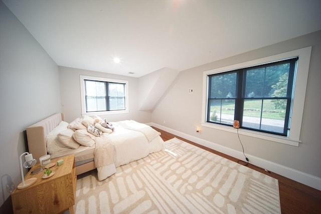 114 Country Club Way, Kingston, MA 02364 - bedroom featuring baseboards, wood finished floors, and multiple windows