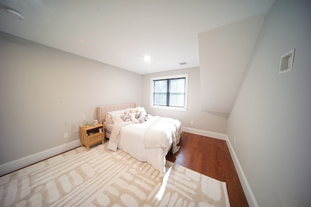 bedroom featuring hardwood / wood-style flooring