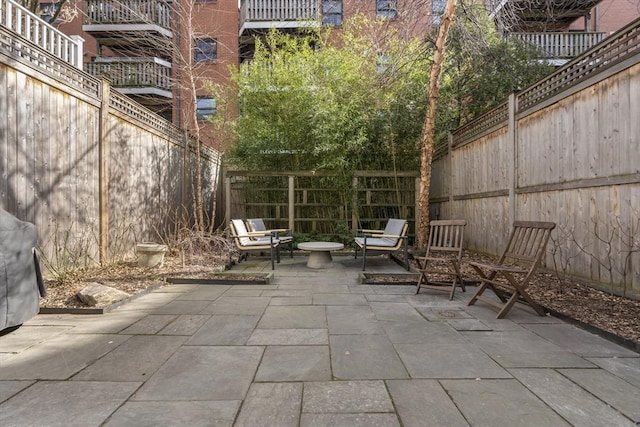 view of patio featuring a fenced backyard