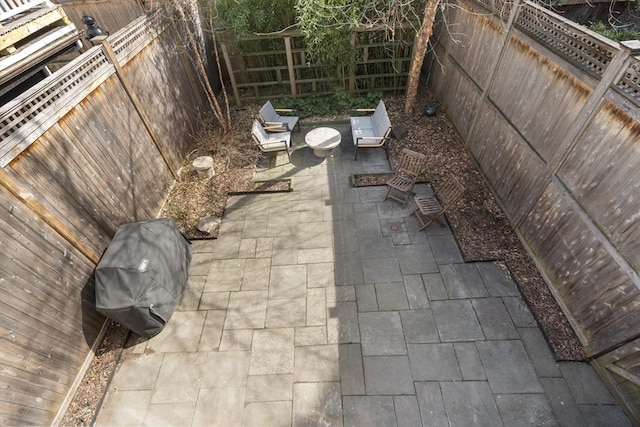 view of patio featuring a fenced backyard