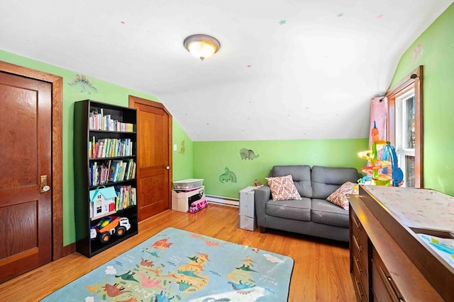 living area with baseboard heating, baseboards, light wood-type flooring, and lofted ceiling