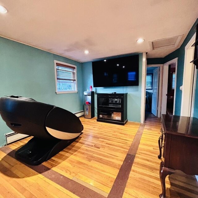 368 W St, Randolph, MA 02368 - living room featuring attic access, light wood finished floors, recessed lighting, and a baseboard radiator