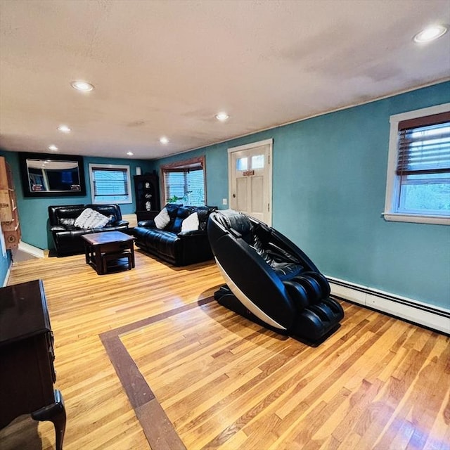 368 W St, Randolph, MA 02368 - living room featuring wood finished floors, recessed lighting, baseboards, and baseboard heating